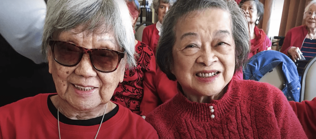 two resident women smiling