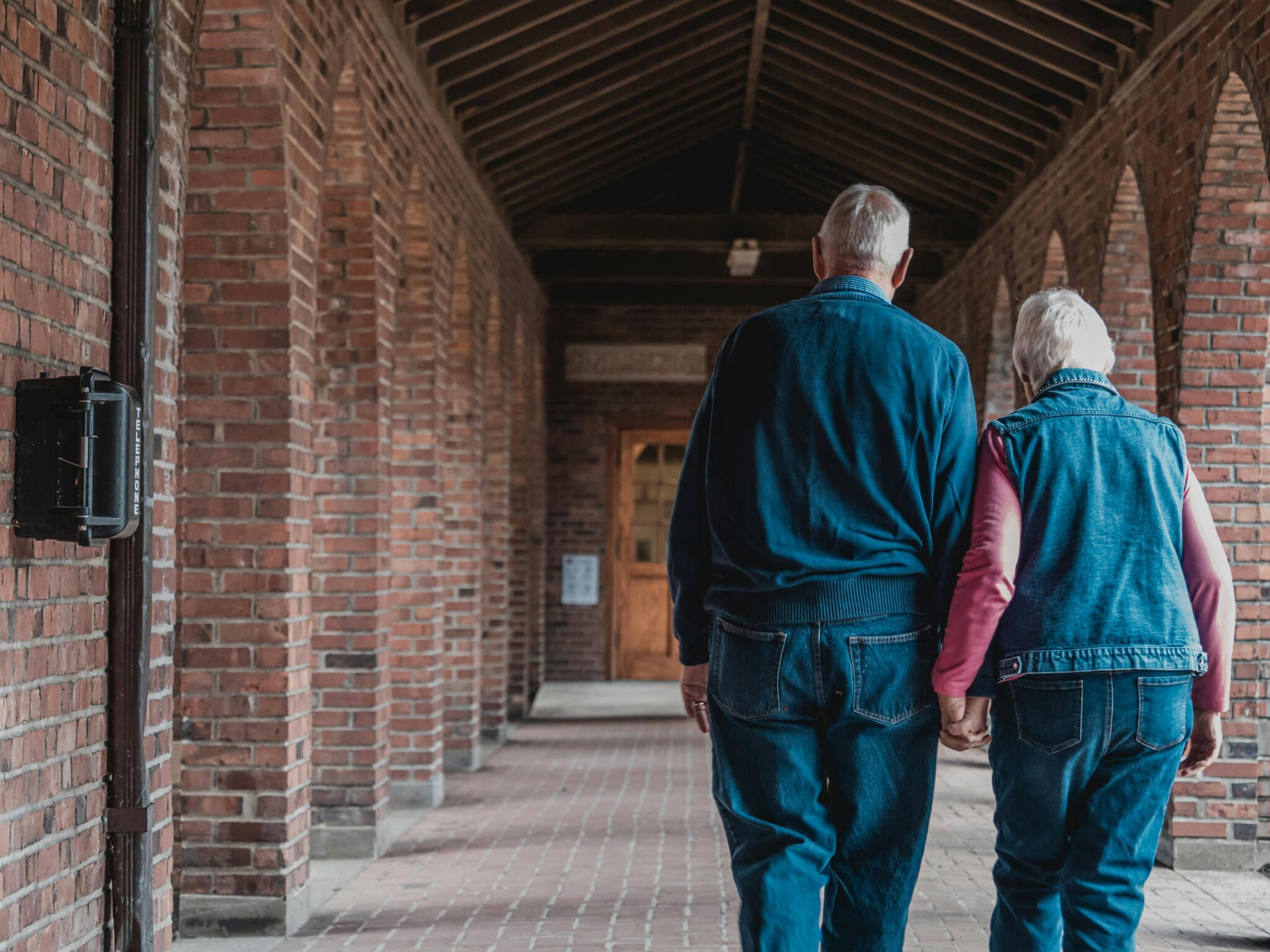 A couple walking and discussing what is dementia.