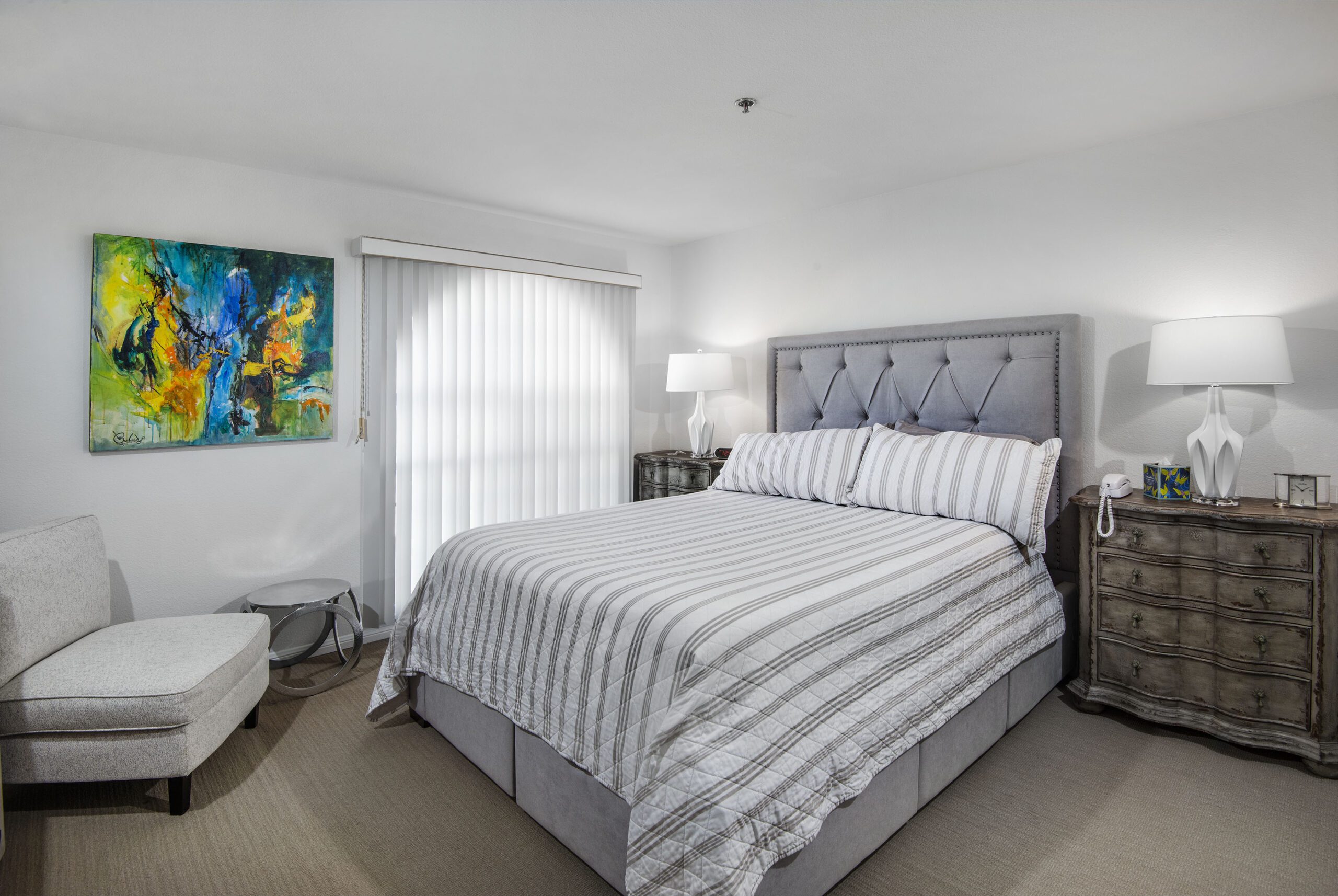 model bedroom with gray decor for retirement community