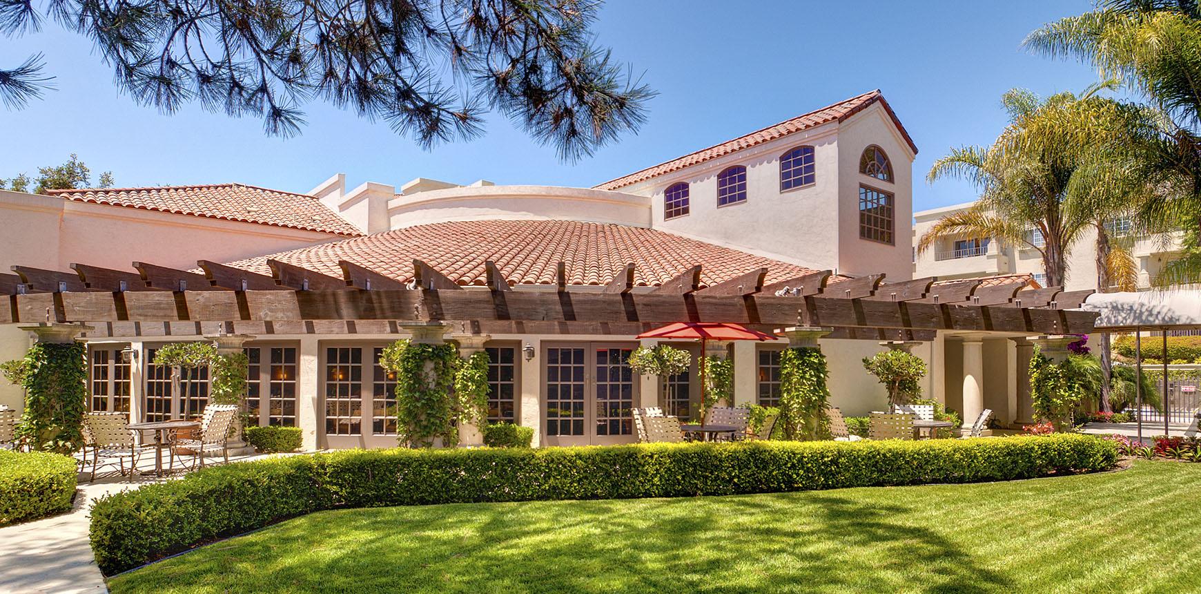 outside view of la vida del mar, with outer terrace and the building behind it