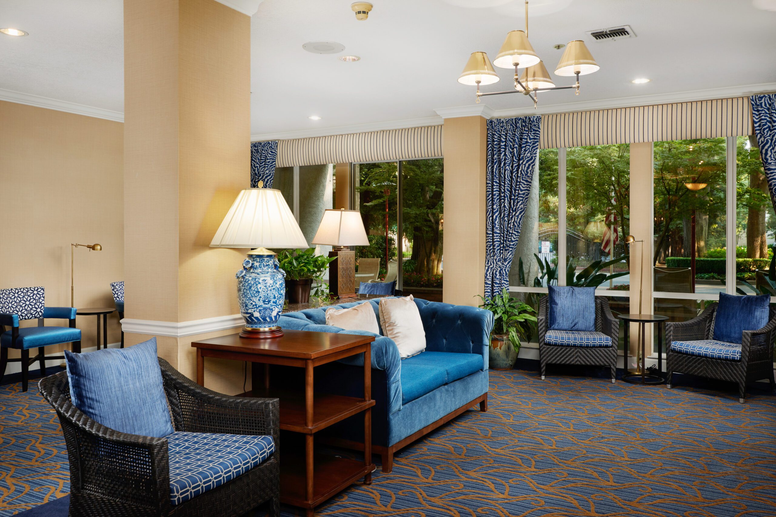 upscale living room at a retirement community with blue furniture