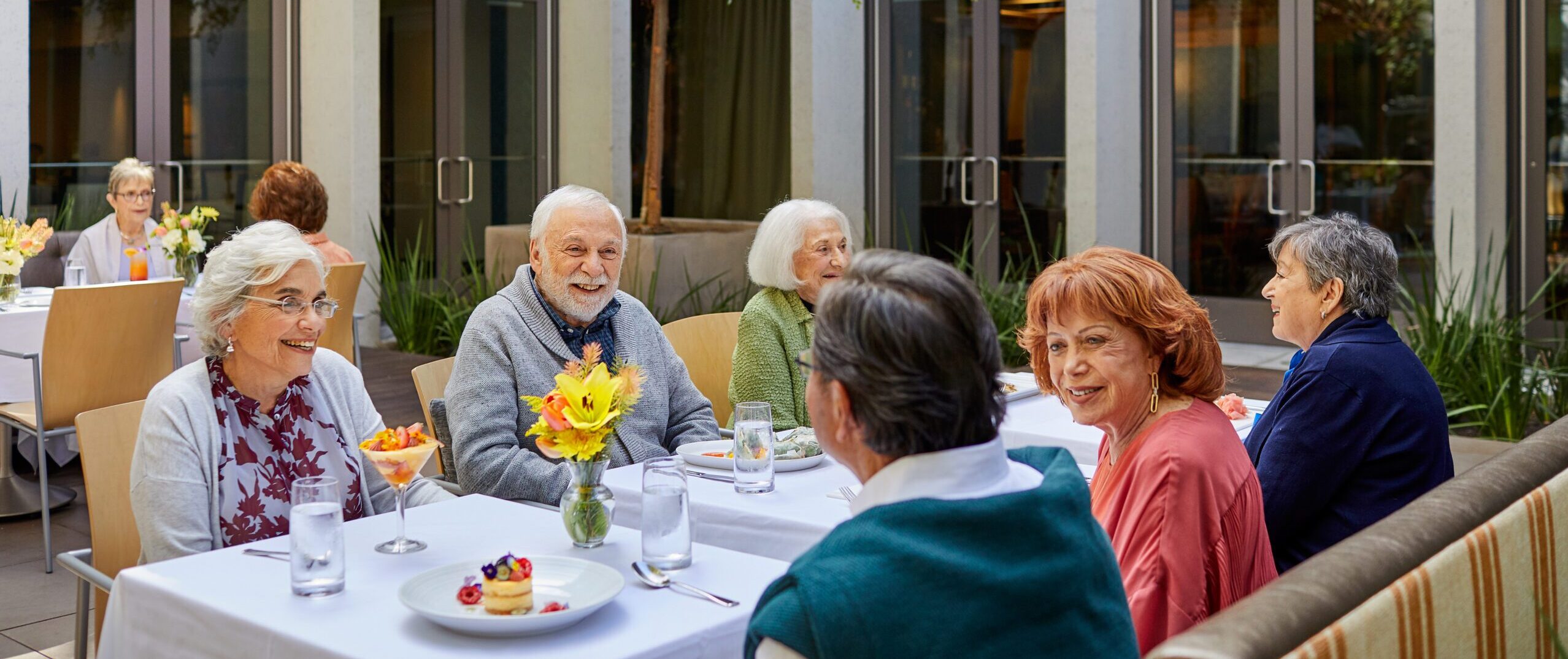 Seniors on patio for dinner