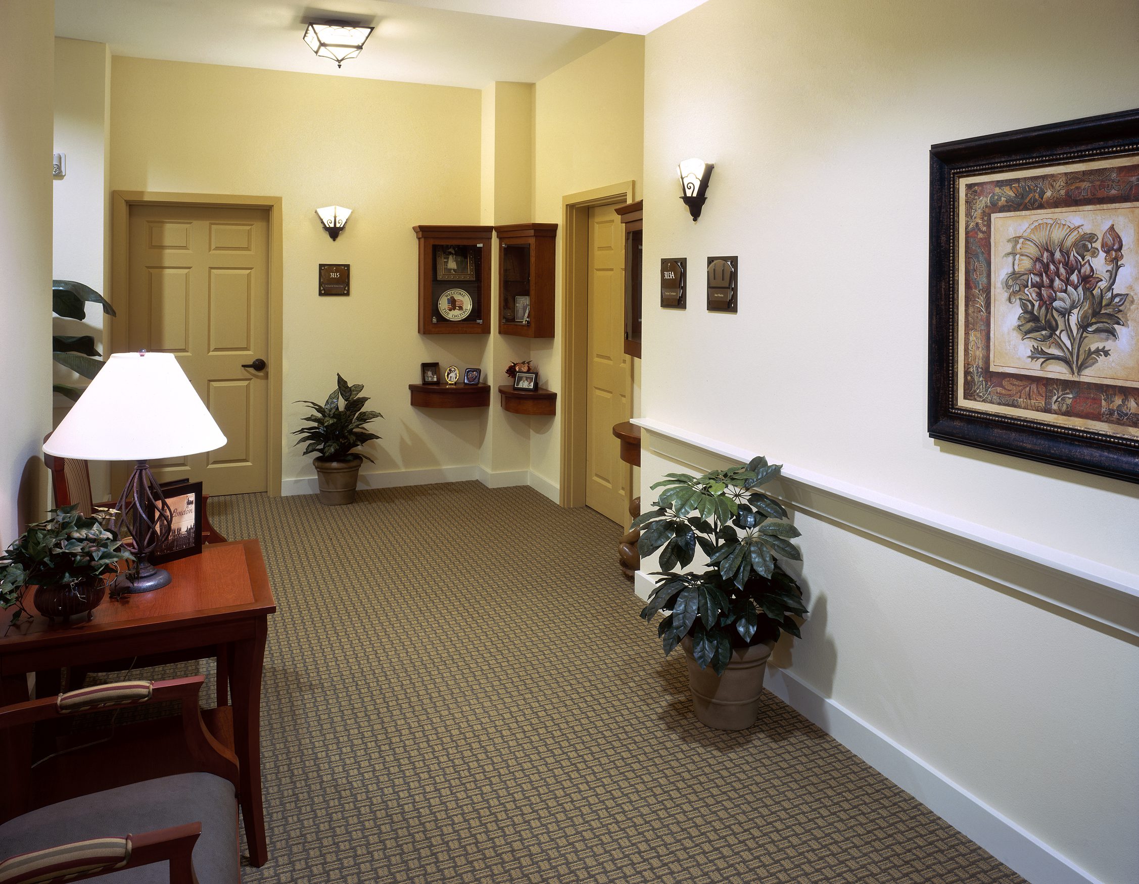 hallway with doors to residences