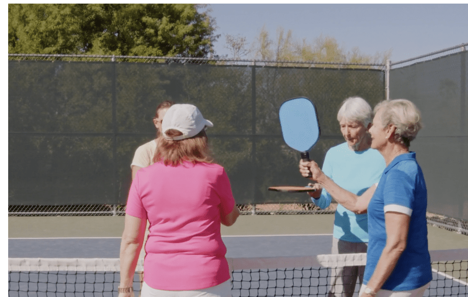 Seniors playing pickleball