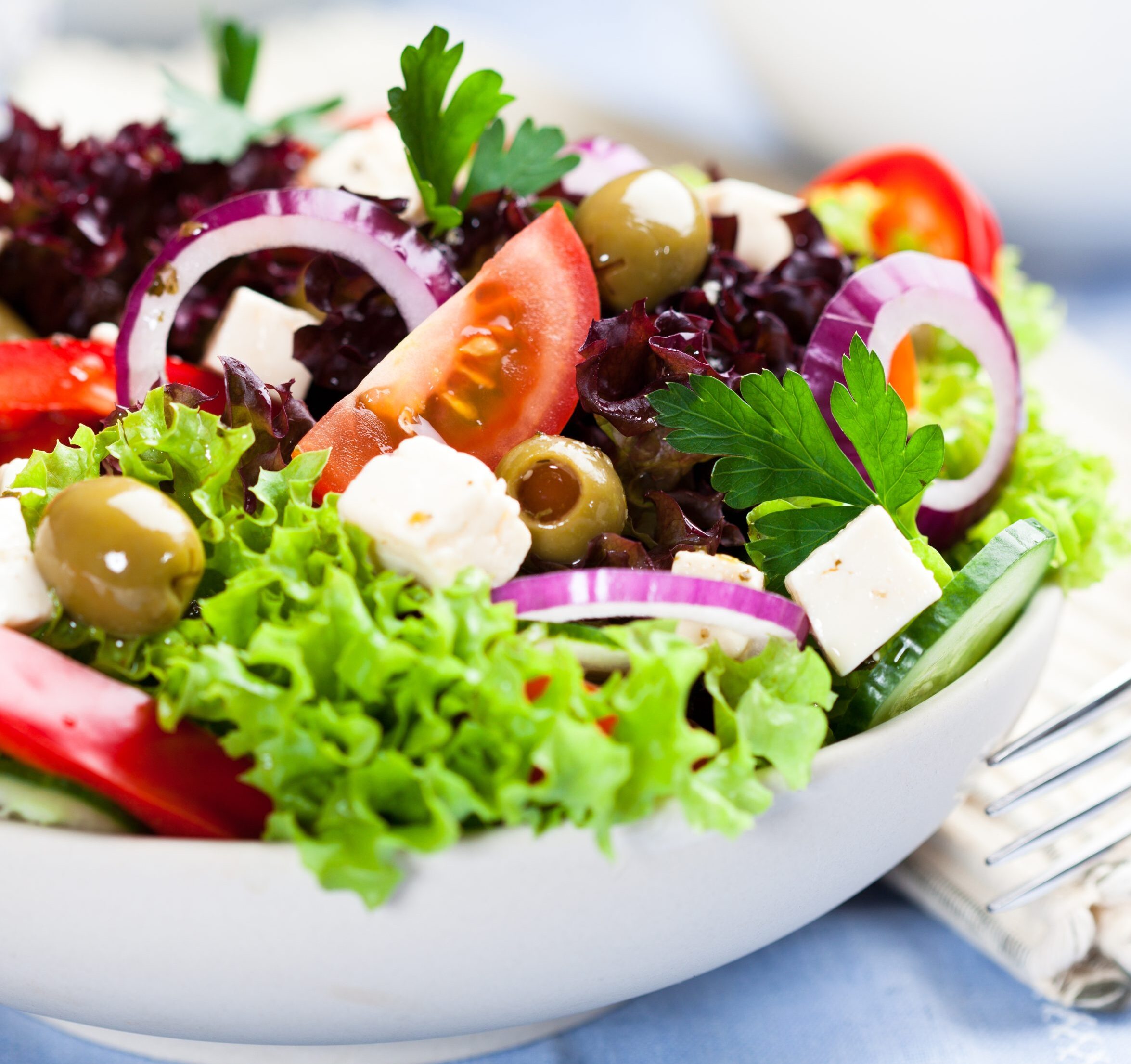 greek salad with pepper stuffed olives