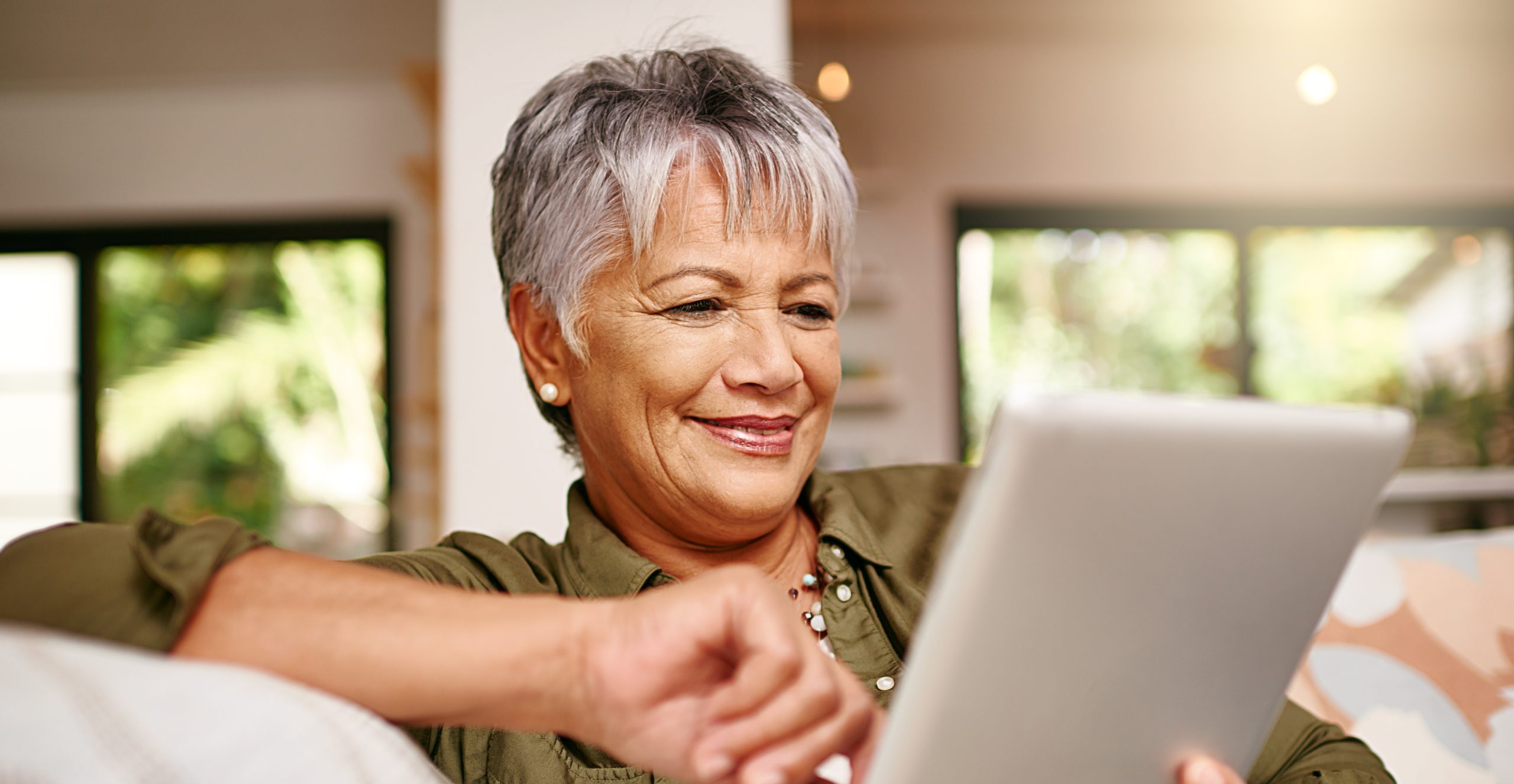 elderly woman on her ipad