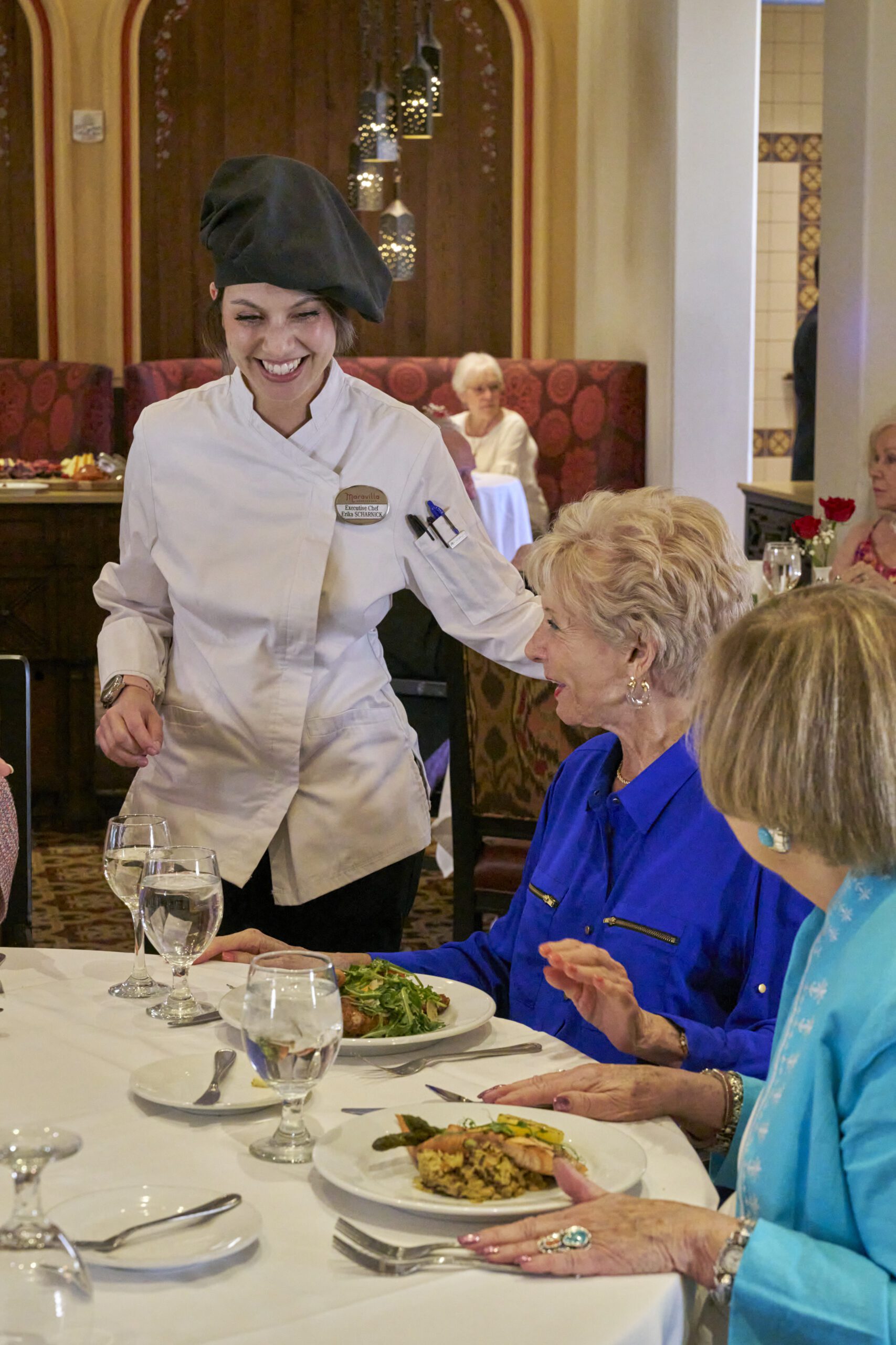 chef talking with residents