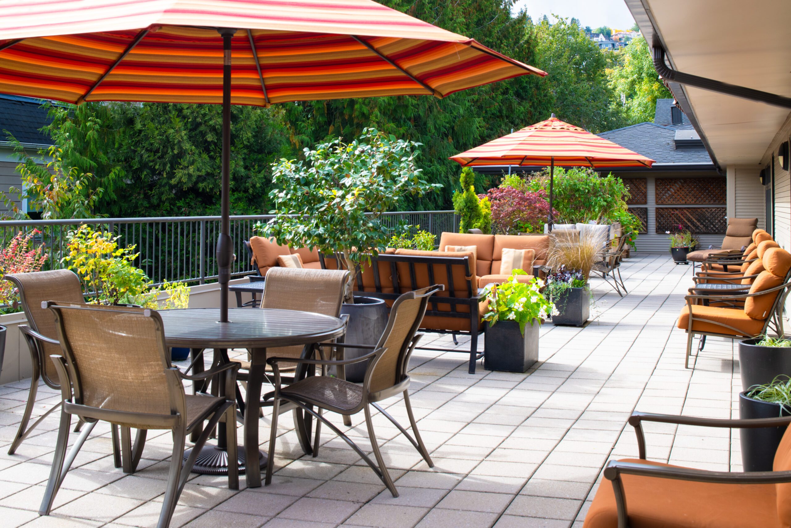 northwest place outdoor patio with umbrellas and tables