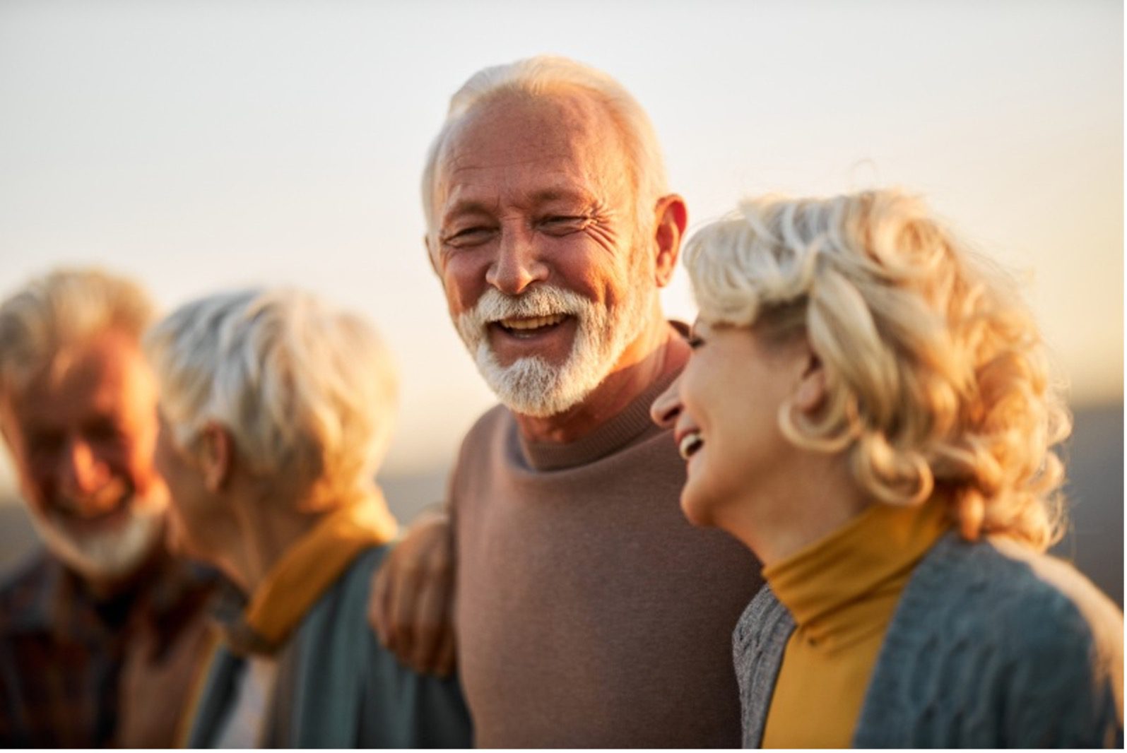 srg-stress-free-retirement A retired man smiling outside by Senior Resource Group